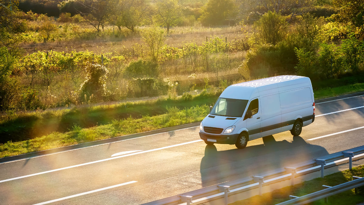 Delivery truck driving the road part of the logistics efficient tracking to have optimized routes